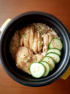 Hainanese Chicken rice in rice cooker top view