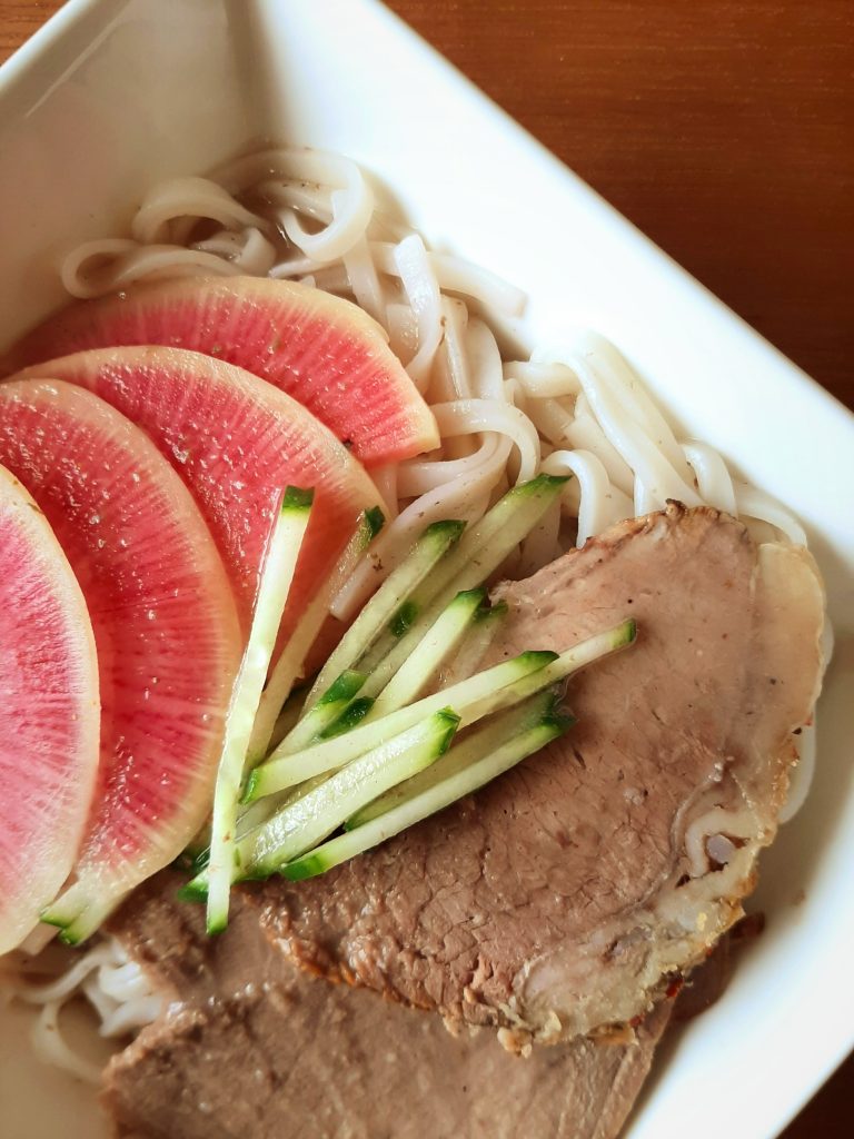 Roast Beef Pho with cucumbers and watermelon radish