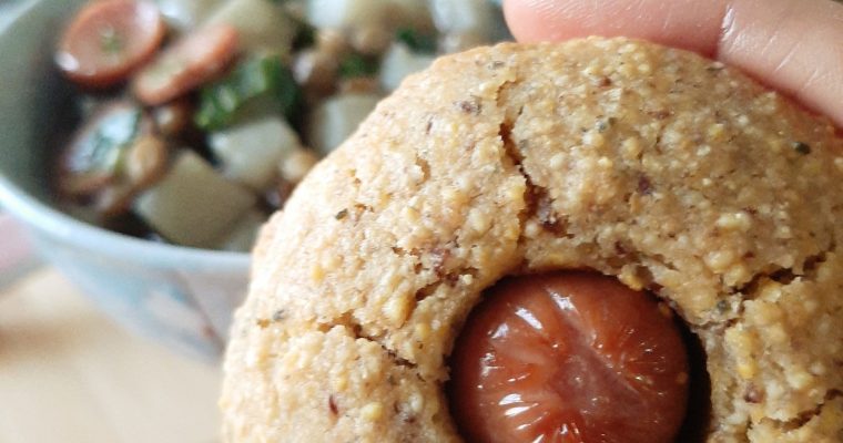Gluten-free Corn dog muffin top view with potato lentil stew in the background