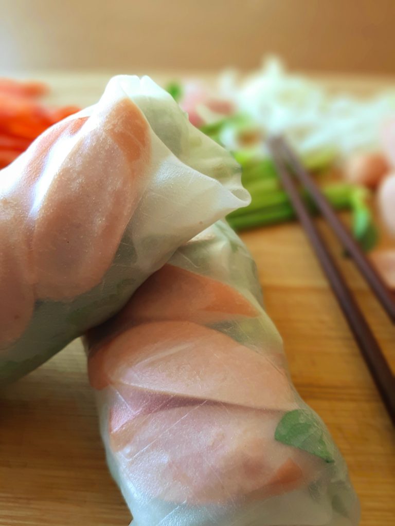 Hot Dog Fresh Roll close up with chopsticks on the side