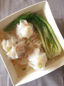 Gluten free wonton in noodle soup with bok choy