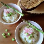 Dandelion ochazuke with pickpled onion and asparagus on top