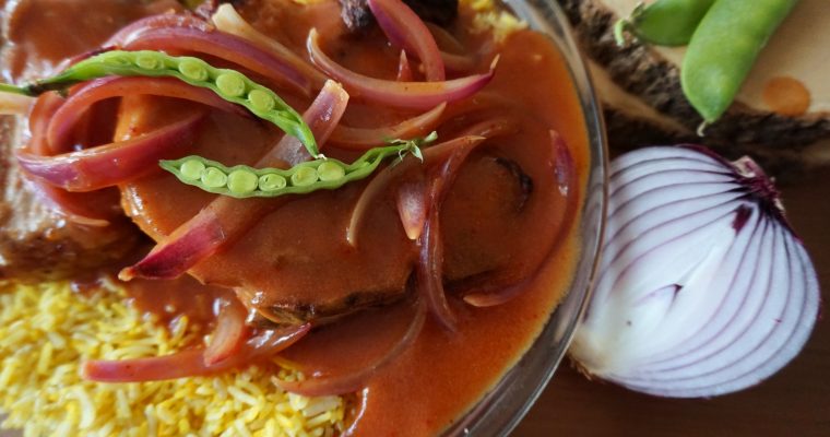 Hong Kong-style Pork Chop on Rice with tomato onion sauce