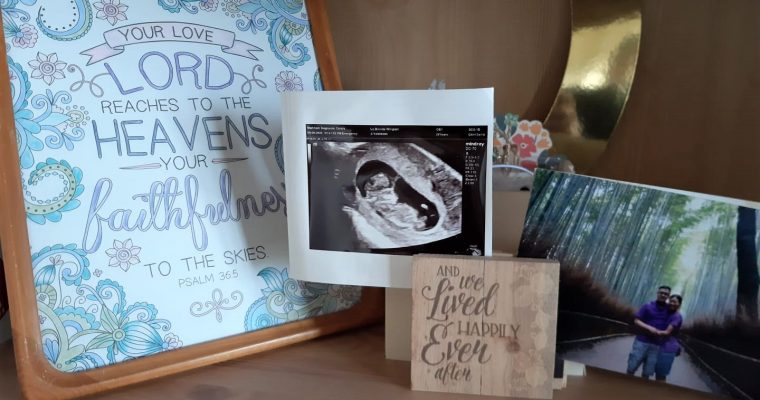 First trimester scan with bible verse and picture of us