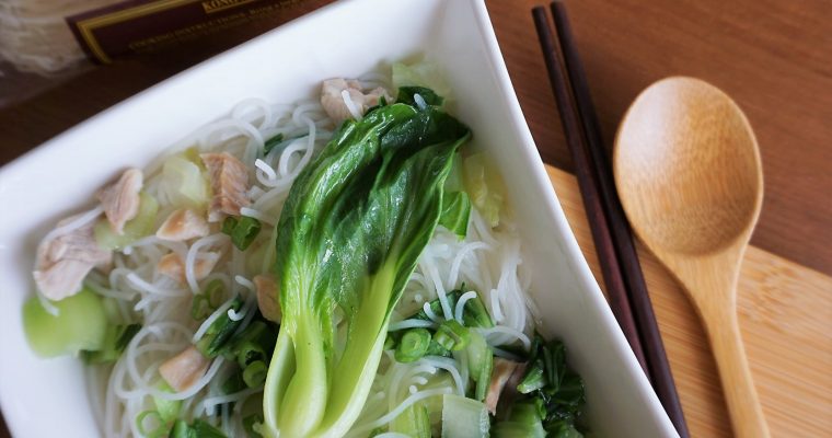 Shanghainese noodle soup with tender chicken with vermicelli package on top of picture