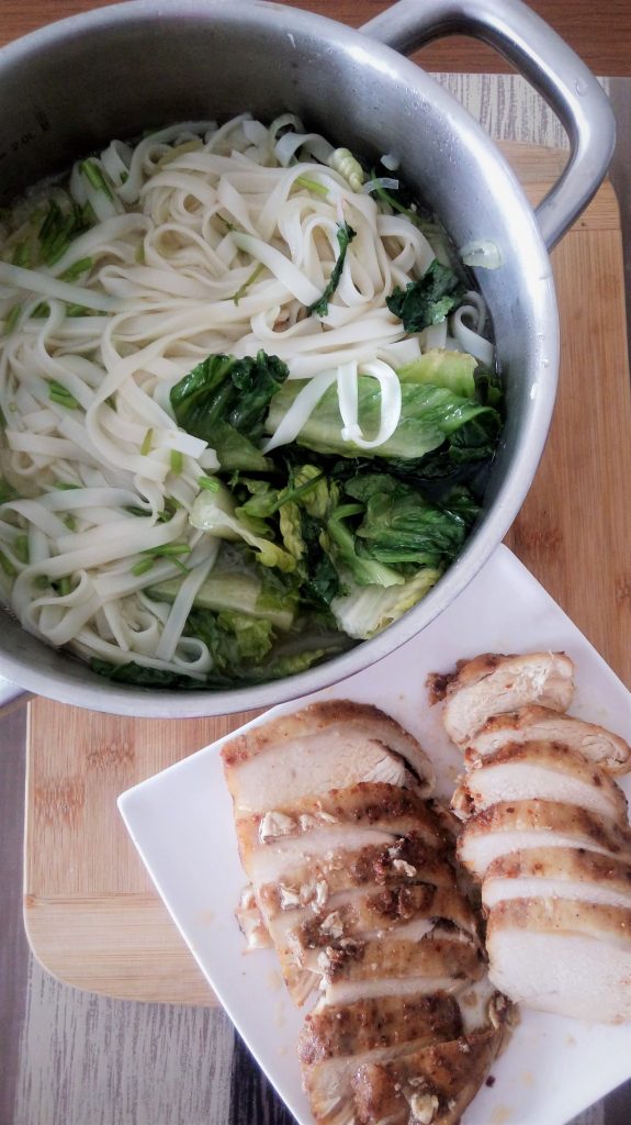 Five spiced chicken breast on rice noodles