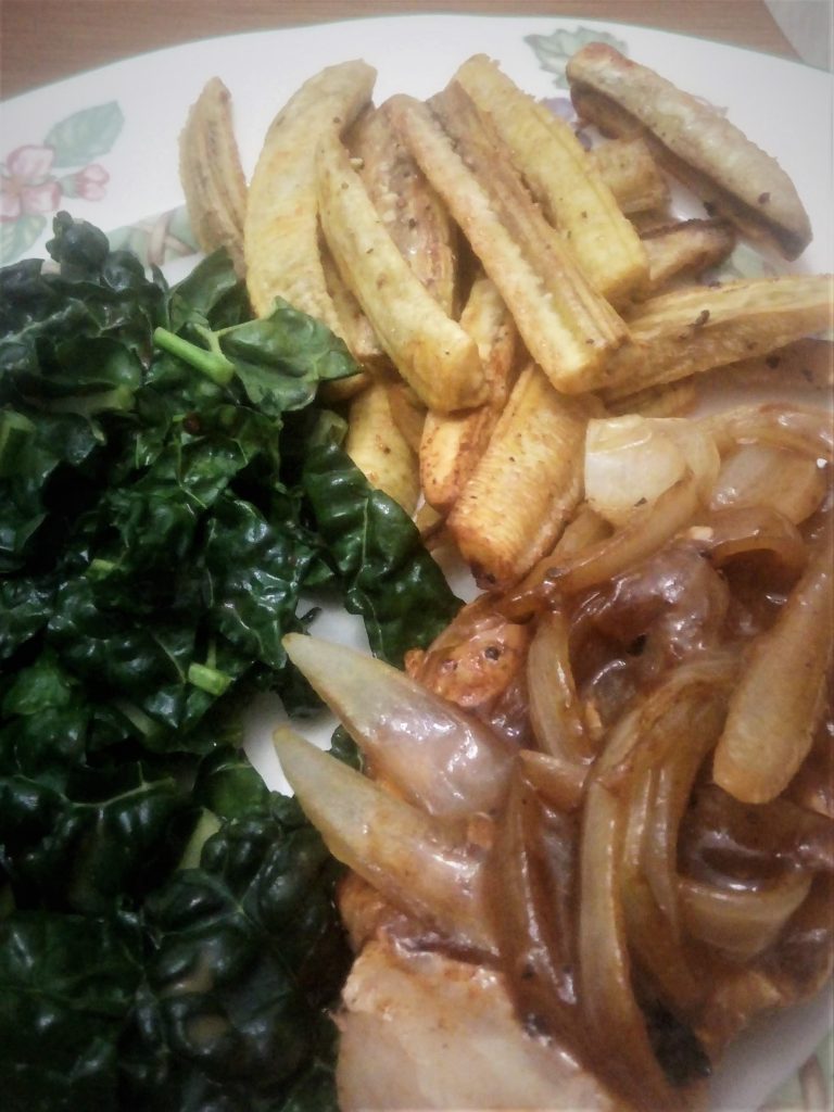 Pork chop cutlet with onion gravy and green banana fries