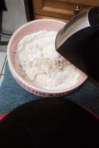 Sitting down in the kitchen when mixing gluten free bread dough in third trimester