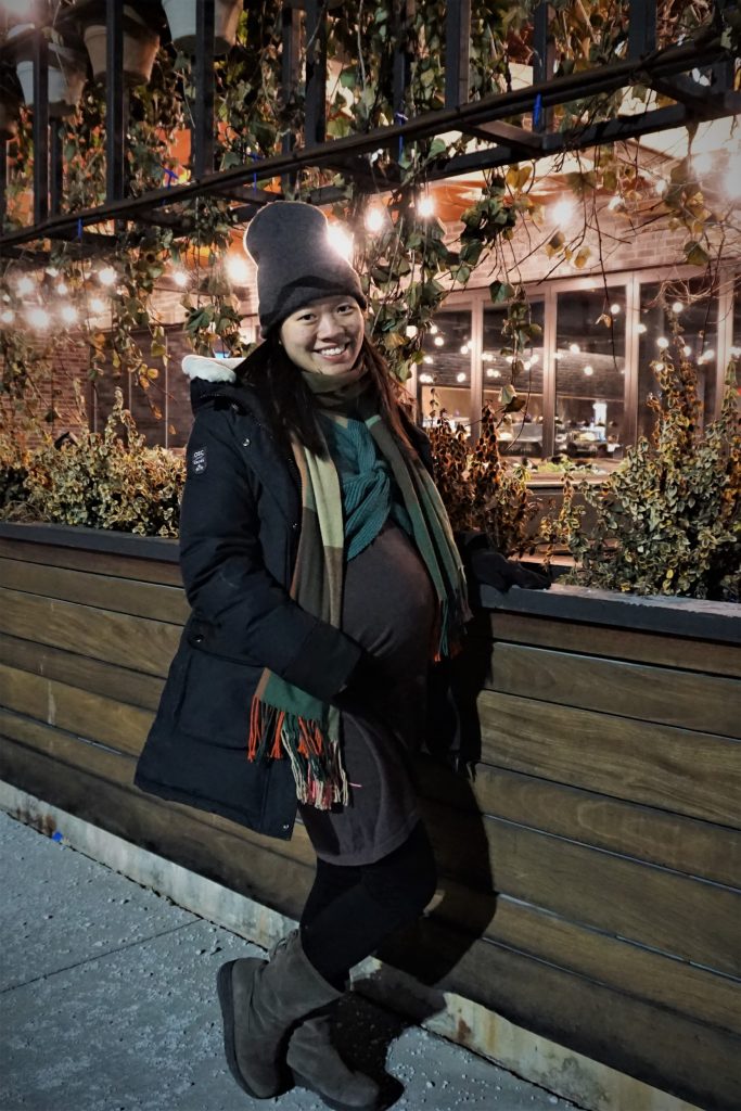 Third trimester make up photo shoot outside restaurant patio