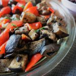 Steamed spare ribs in a glass dish at an angle